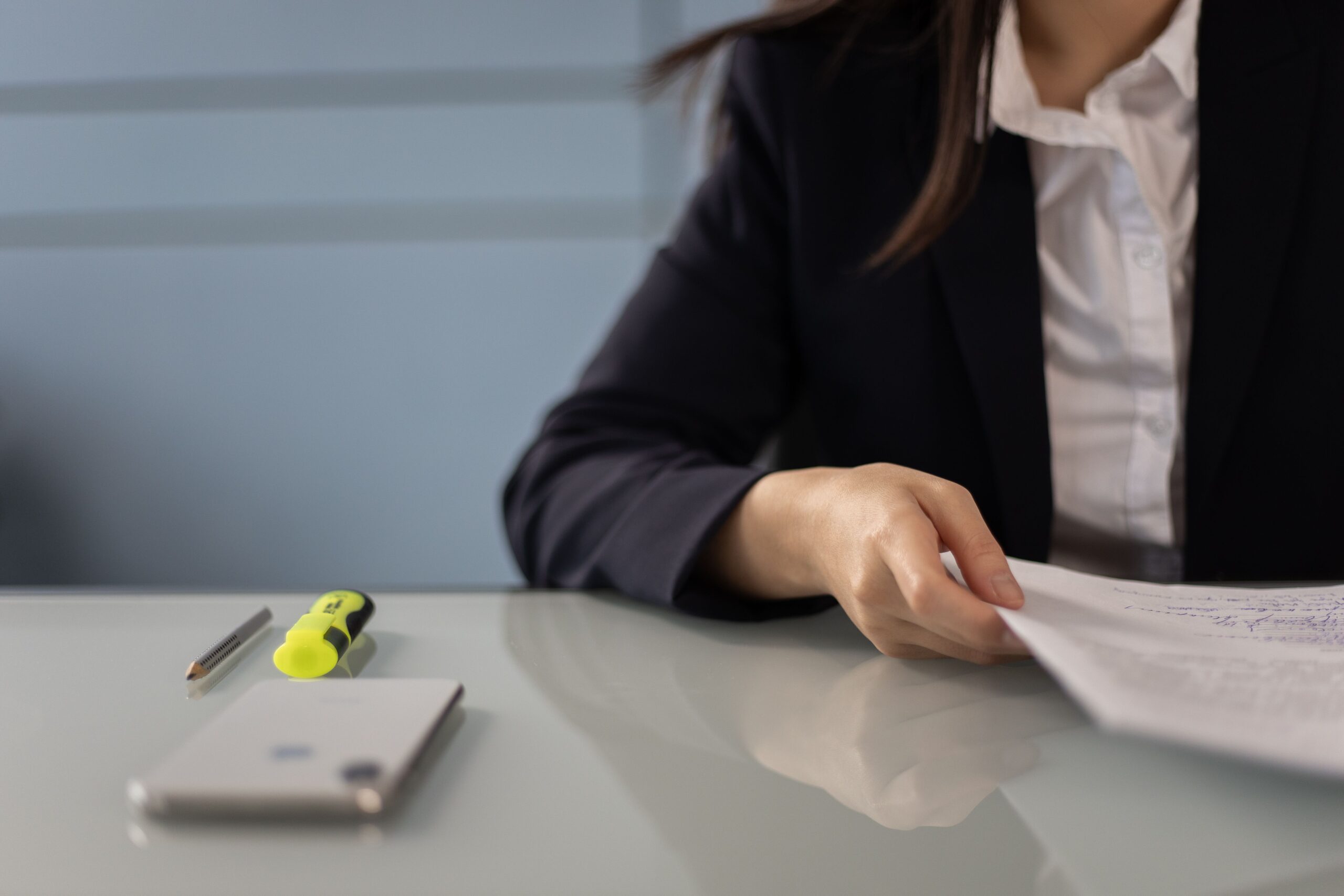 Notary applying official wax seal and signature to real estate deed